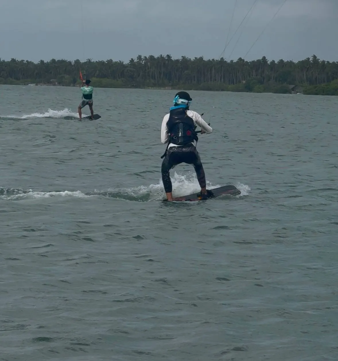 Two riders on the lagoon