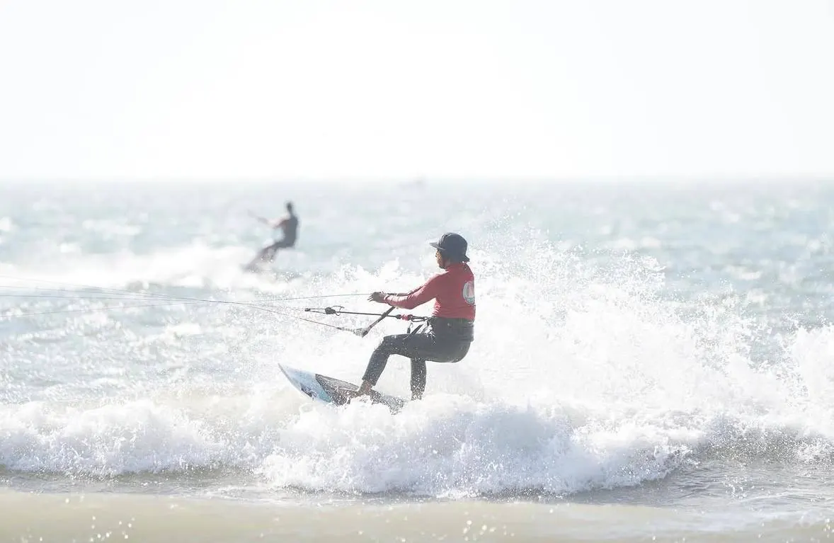 Rider carving through whitewater